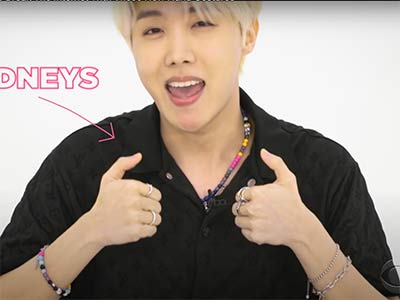 BTS hand gesture "kidneys"